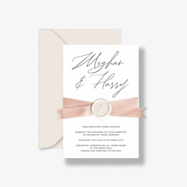 Sealed satin wedding invitation with satin ribbon and wax seal