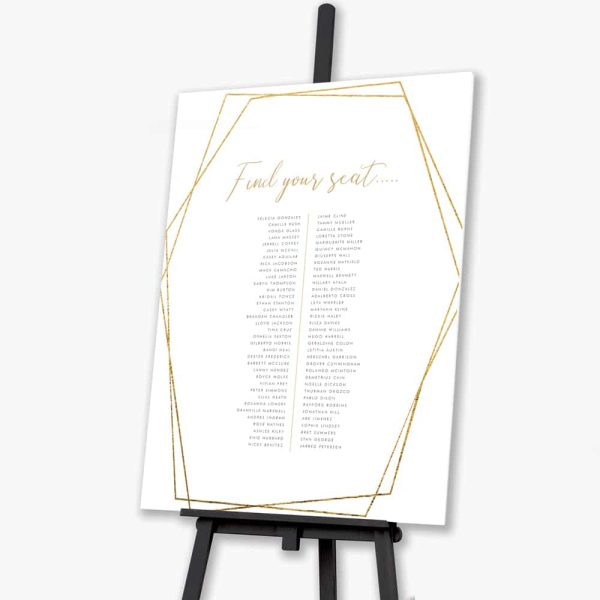 Geometric foliage wedding seating plan on black easel