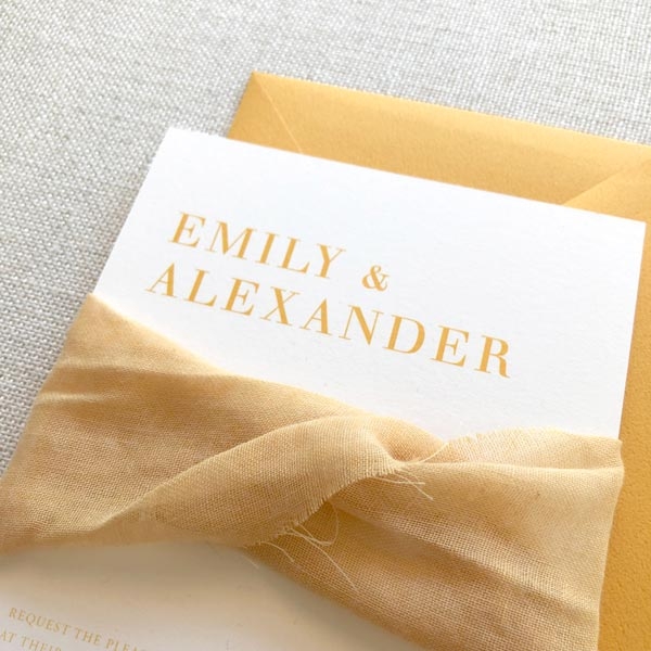 Unique to Starfish Lane, striking invitation wrapped in bright amber muslin ribbon, silk ribbon, mustard invitation