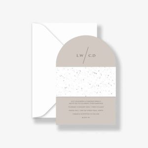 Arched terrazzo wedding invitation suite with stone coloured arch invitation and terrazzo white belly band