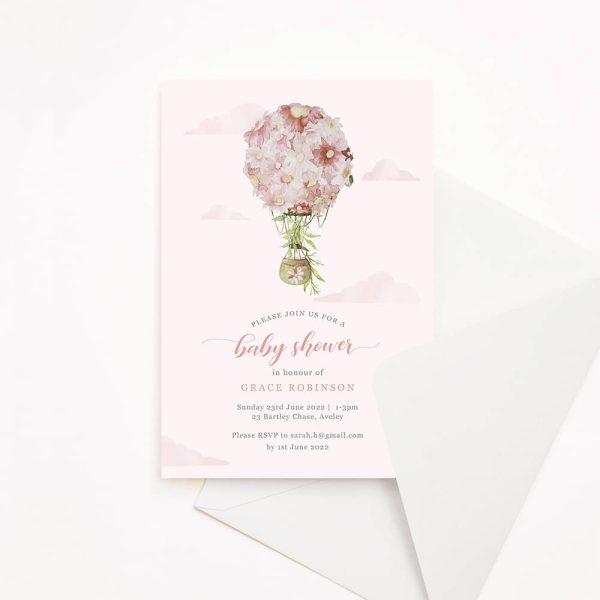 Baby shower invitation with pink background and pink watercolour hot air balloon