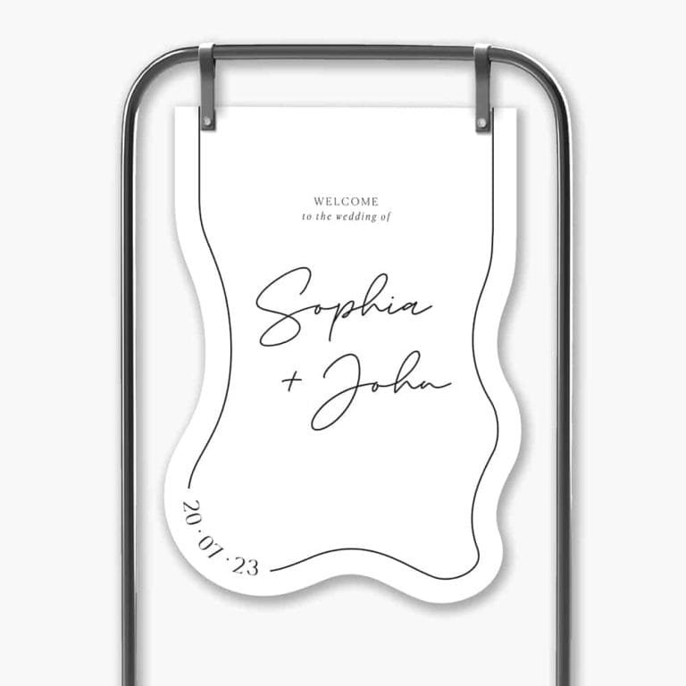 ombre noir welcome sign hanging in black frame