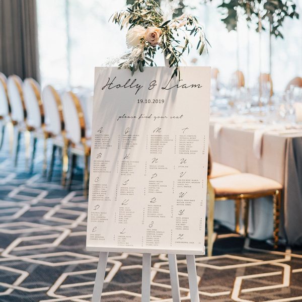 Minimalist alphabetical welcome sign at wedding