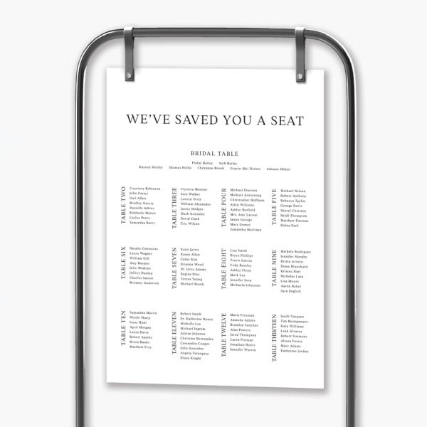 Saved you a seat wedding seating plan hanging in black frame