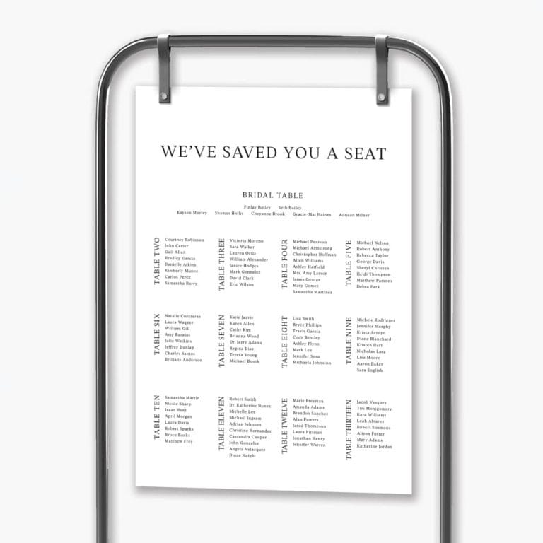 Saved you a seat wedding seating plan hanging in black frame