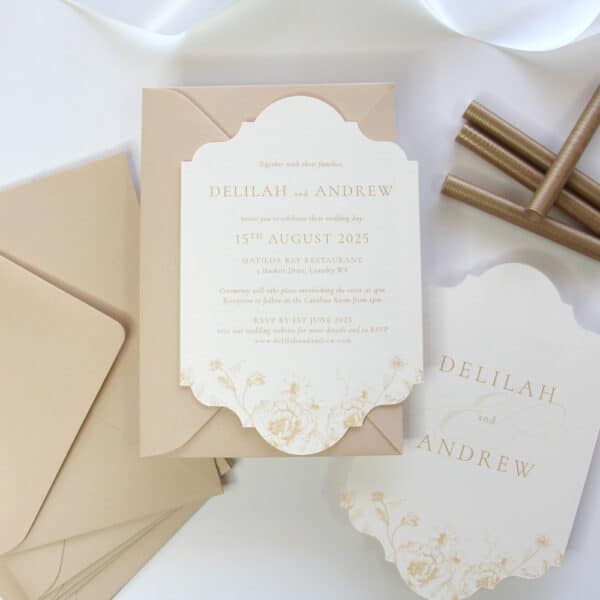 buttercream yellow wedding invite with envelopes and sealing wax