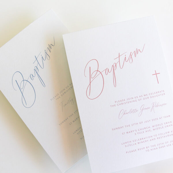 A baptism invitation with simple cursive writing and envelope